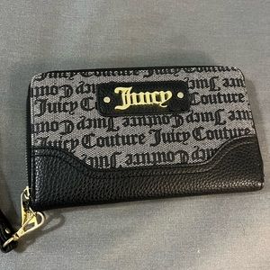 NWOT - Juicy Couture wallet.  Never used; Excellent Condition.